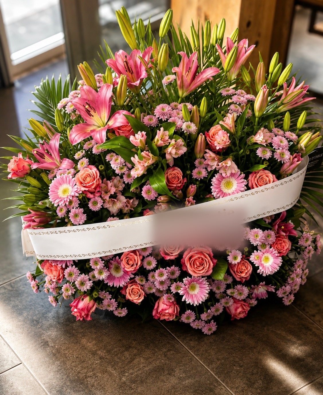 Composition de deuil rose Fleurs d'Émile Pégomas